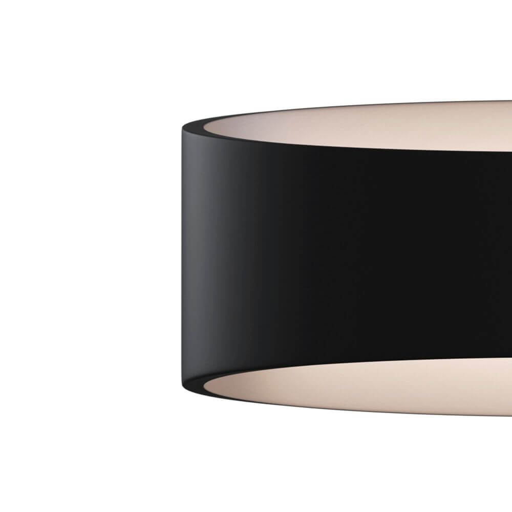 Marcus LED-Wandleuchte in modernem Design mit schwarzem Lampenschirm und sanfter Beleuchtung.