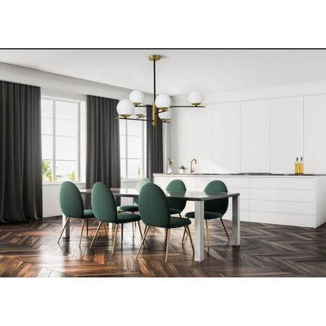 Nostalgia Hängelampe Mini im modernen Esszimmer mit eleganten grünen Stühlen und stilvoller Holzfußboden.