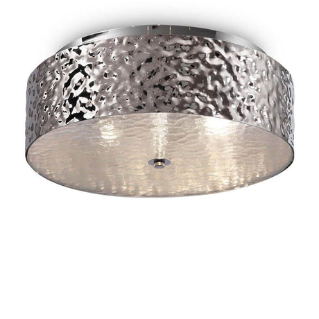 Ripple ceiling light Ø 35cm chrome with grooved metal surface and water ripple effect.