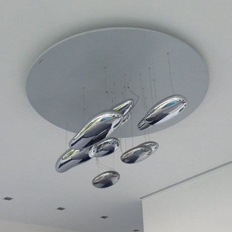 Artemide Mercury Sospensione Inox pendellamp roestvrij staal met futuristisch design en warm licht.