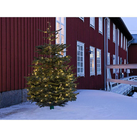 Weihnachtlicher Baum im Schnee mit 58m Micro LED Lichterkette mit 8 Funktionen 180 Warmweiße Dioden IP44 beleuchtet.