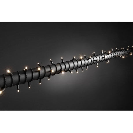 10 m mikro LED Fairy lights IP67 80 varme hvide dioder IP44 på en sort baggrund, ideel til vinterdekoration.