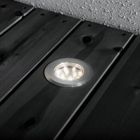 Mini LED recessed spotlight 3-piece set IP44 stainless steel on a black wooden base.