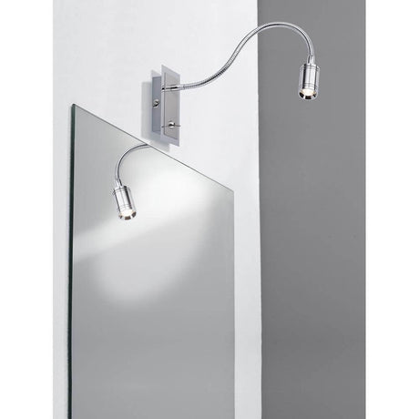 Mirror Zylindro bedside reading light 1x3W LED chrome DC 700mA mounted on a mirror.