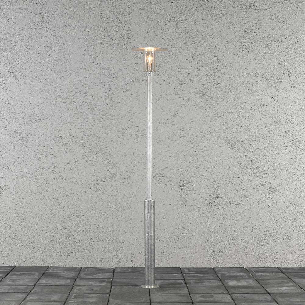 Mode Mastleuchte 220cm galvanisierter Stahl, klares Polycarbonat Glas auf einem Fliesenboden.