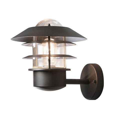 Modena Außen-Wandleuchte Schwarz, klares Glas an einer Wand montiert mit elegantem Design.