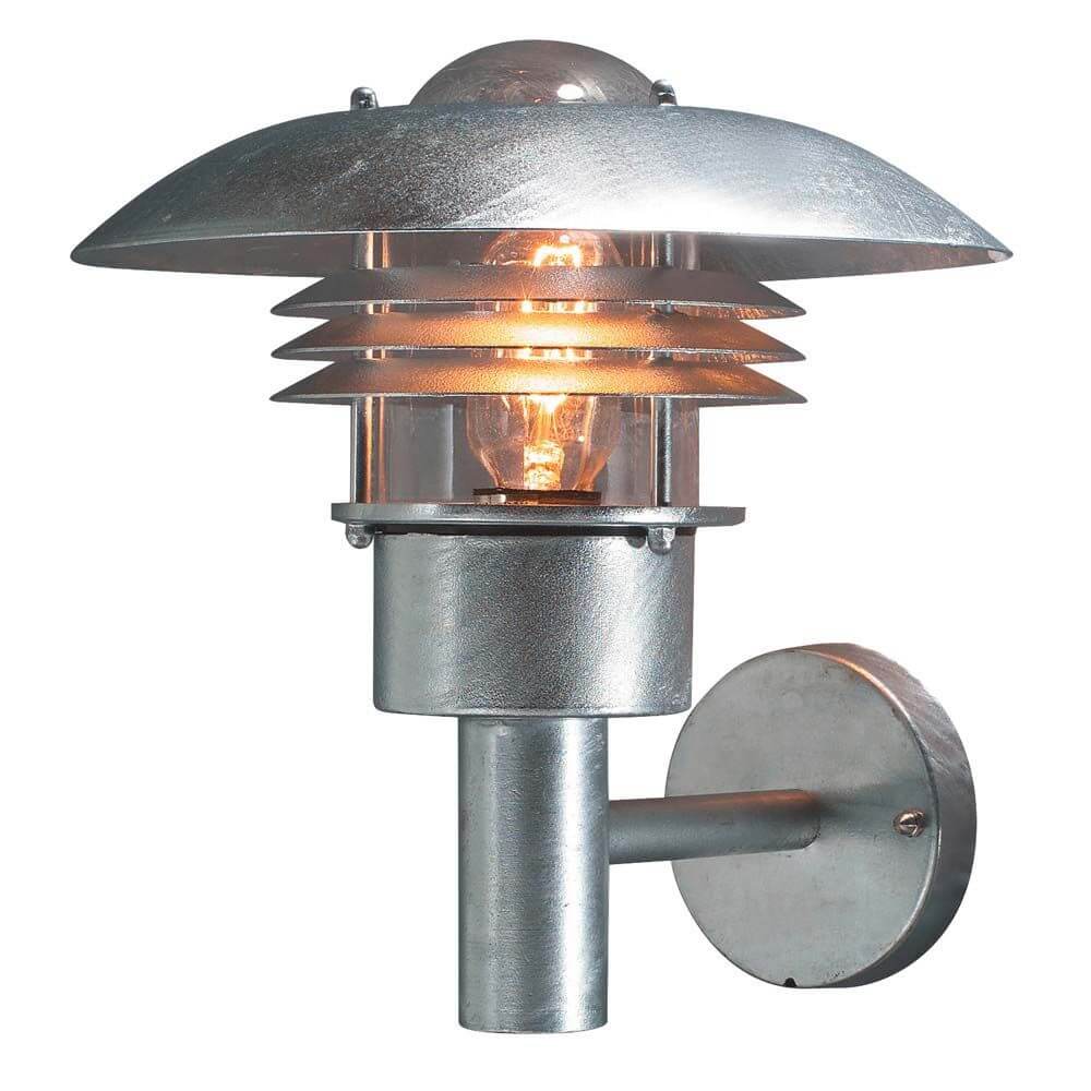 Modena Außen-Wandleuchte galvanisierter Stahl, klares Glas mit warmem Licht und modernem Design.