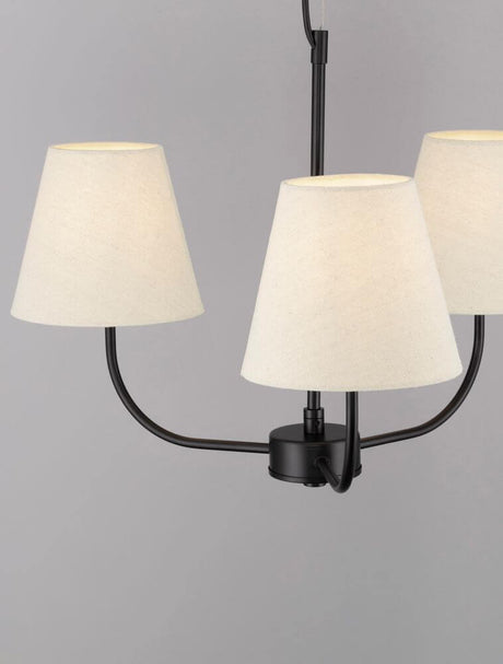 Suspension Moist à 3 lampes Ø 52 cm noir, beige avec abat-jour couleur crème et structure métallique fine.