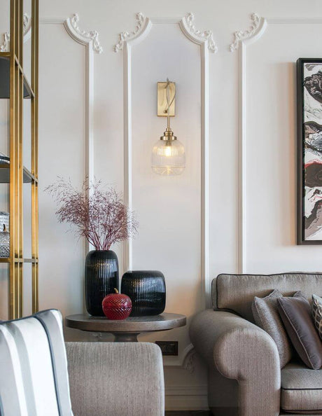 Moon wall light Gold, Transparent on an elegant wall with stylish home accessories.