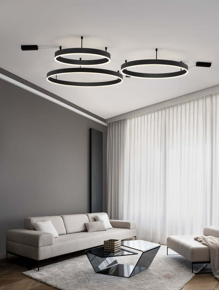 Motif LED Deckenleuchte Ø 100cm 3000K in modernem Wohnzimmer mit eleganter Einrichtung.