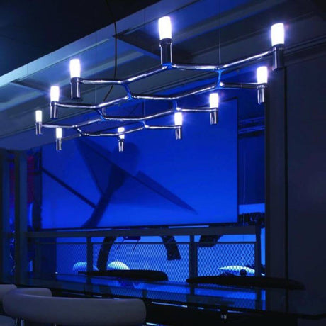 Suspension Nemo Crown Plana 10 lumières. 113 cm au design moderne avec des sources lumineuses diffuses et une élégante finition métallique.