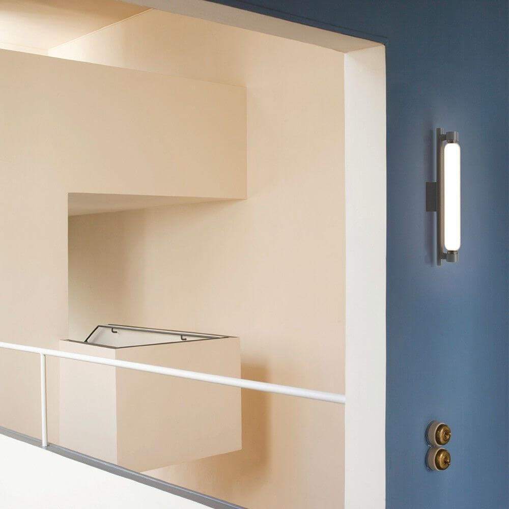 Nemo La Roche LED Wandlampe an einer minimalistischen Wand in einem eleganten Innenraum.