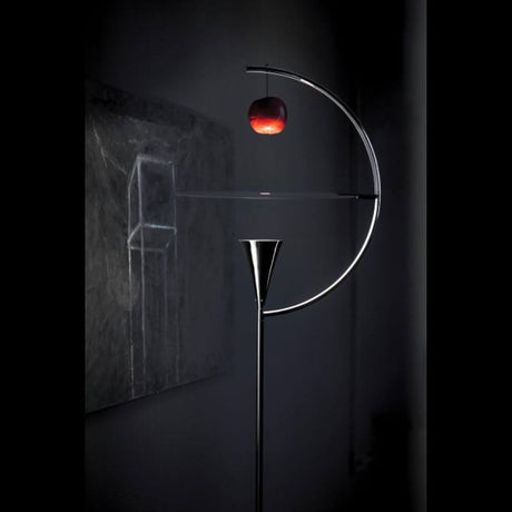 Nemo Newton LED floor lamp with foot dimmer, modern lighting with a rotatable diffuser and playful design elements.