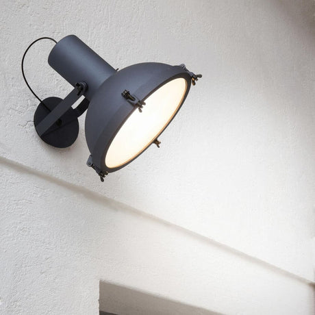 Nemo Projecteur 365 wall spotlight in midnight blue aluminium mounted on a wall.