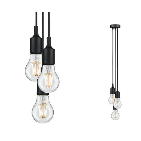 Suspension Neordic Ketil à 3 lampes noire avec des ampoules stylées.
