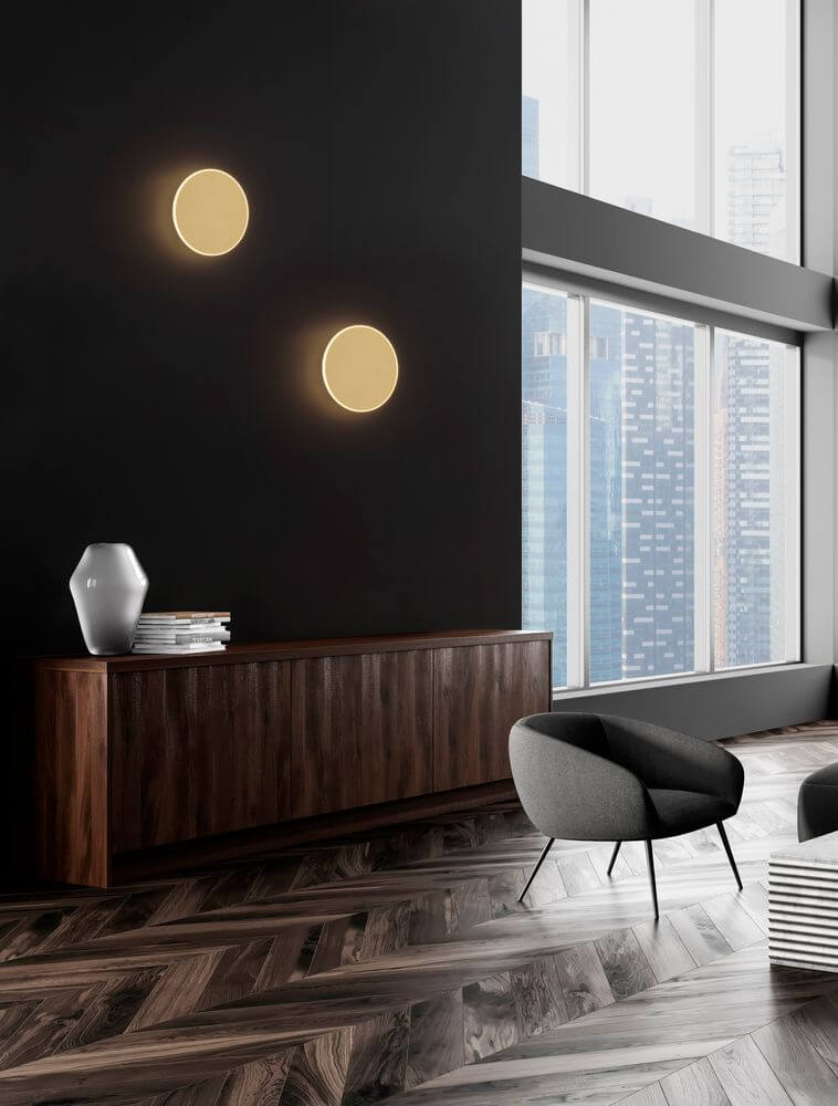Nevo LED Wandleuchte Ø 30cm 3000K an einer modernen Wand mit dunklem Hintergrund.
