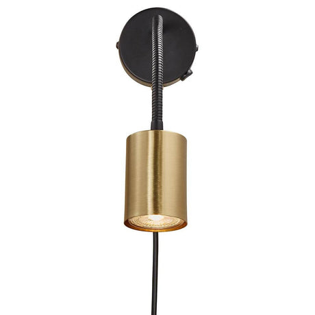 Explore Flex Spot Messing - lampe contemporaine avec tête orientable pour un éclairage directionnel.