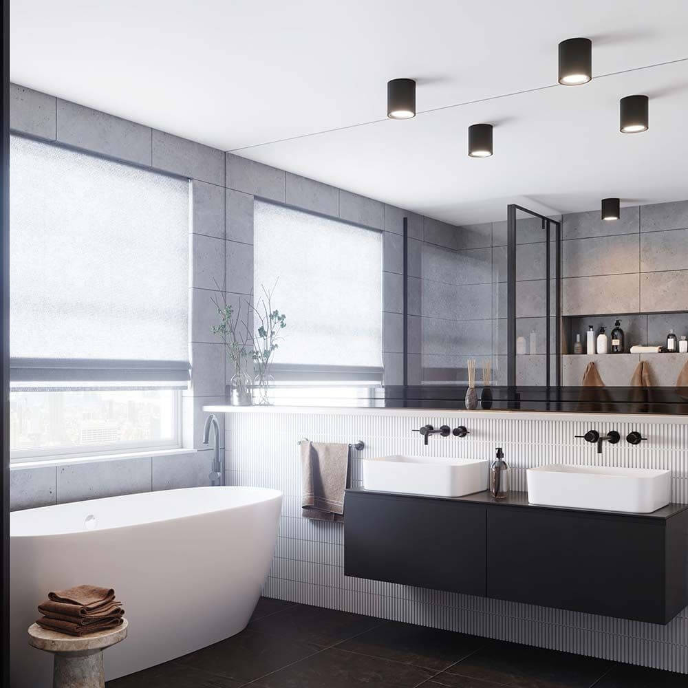 Modernes Badezimmer mit Landon Long LED Deckenspot, eleganter Badewanne und stilvollem Waschtisch.
