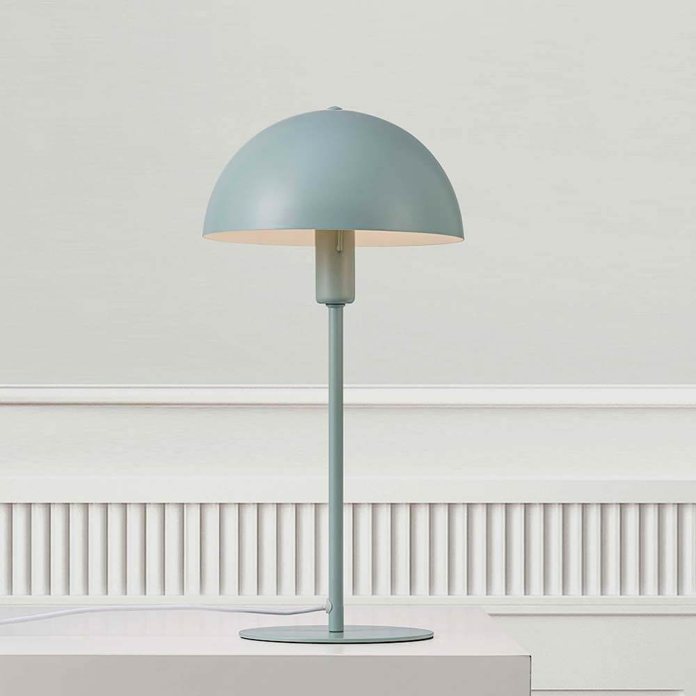 Tischleuchte Ellen Pastell-Grün in elegantem Design mit rundem Schirm und leichtem Rahmen.