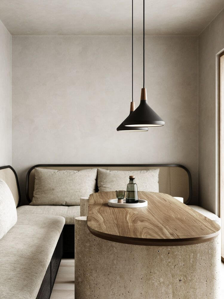 Pendelleuchte Nori 27 in modernem Raum mit organischen Formen und Holz details.