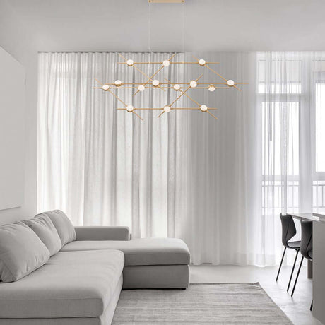 Suspension Atomo LED couleur or dans un salon moderne avec un aménagement élégant.