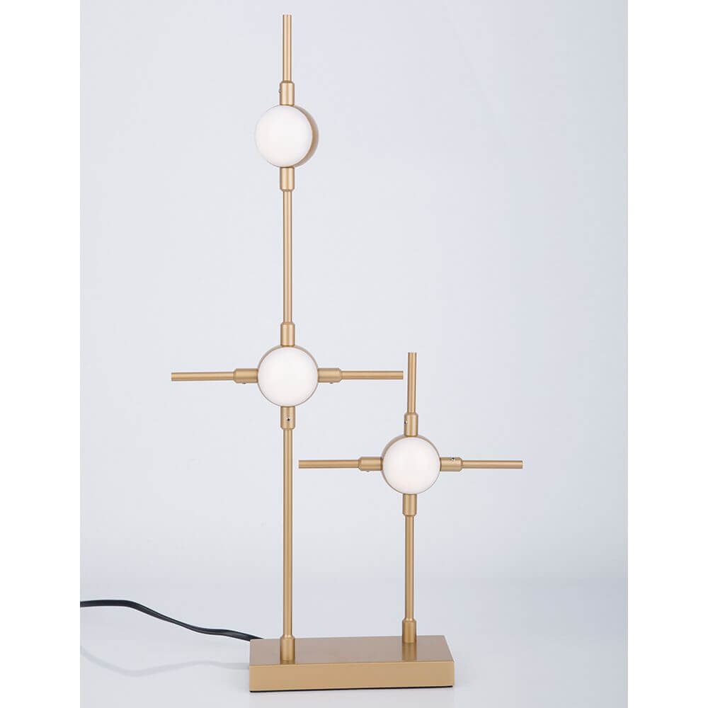 Atomo LED Tischleuchte in modernem Design mit goldfarbenem Metall und runden Lampenschirmen.