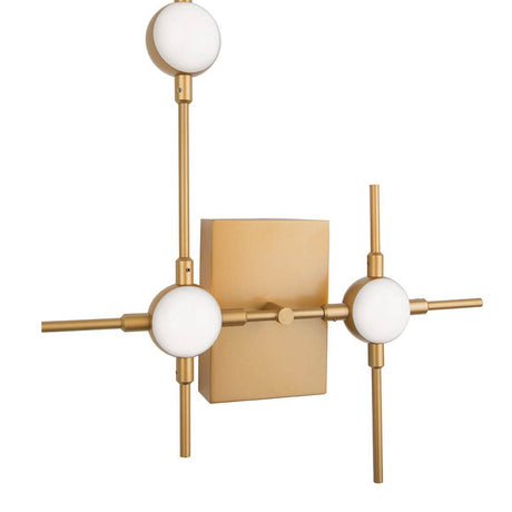 Atomo LED applique murale dorée en acrylique au design moderne et à la lumière blanc chaud pour les espaces de vie.