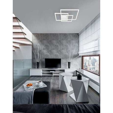 Plafonnier Bilbao LED dans un salon moderne avec design géométrique et silhouette plate