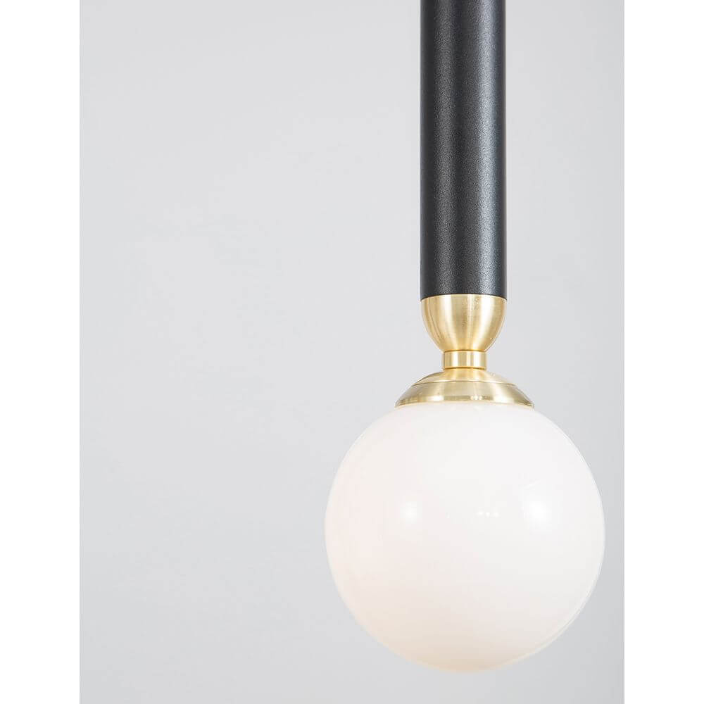 Nova Luce Cayo LED Pendellampe Metall Schwarz mit elegantem Design und weißem Glas für modernes Ambiente.
