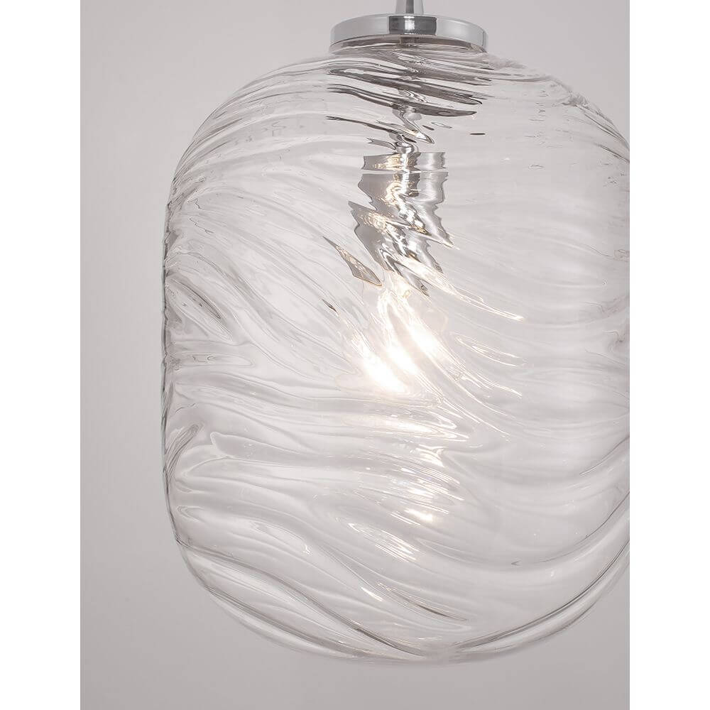 Ficato Glas-Pendellampe mit elegantem Wellenmuster und warmem Licht, ideal für jeden Raum.