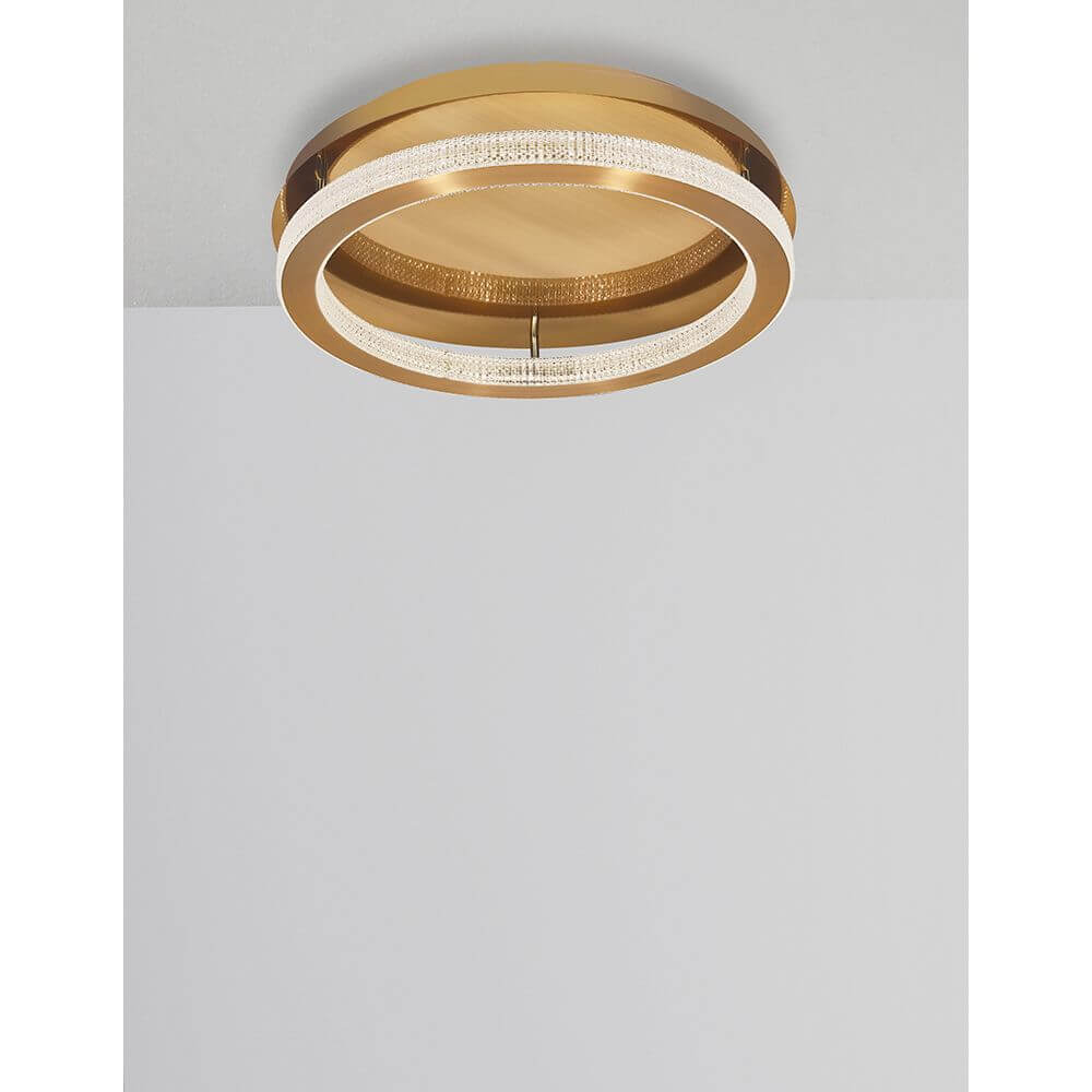 Fiore LED Deckenlampe Antik-Gold mit funkelnden Kristallelementen und warmem Licht.
