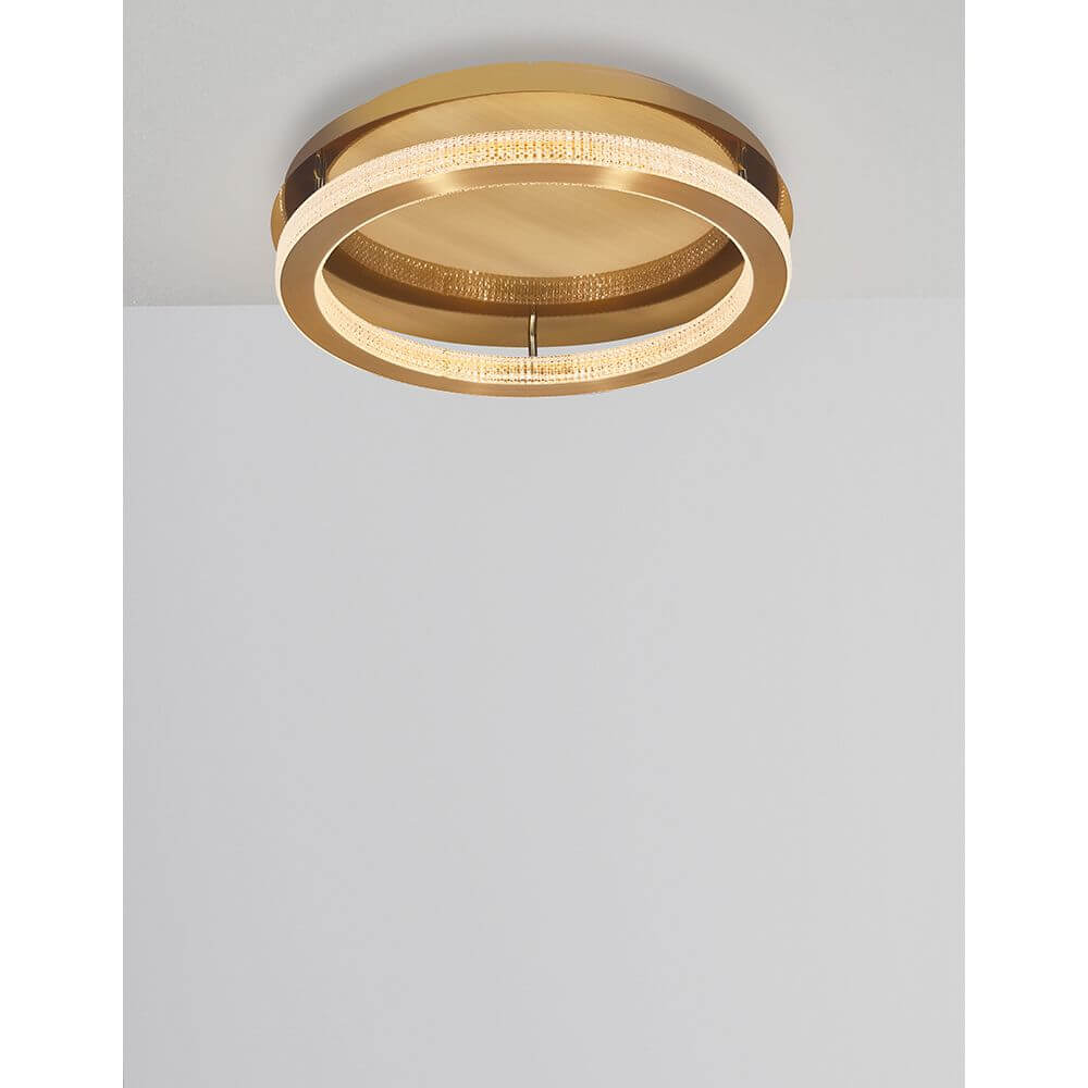 Fiore LED Deckenlampe Antik-Gold mit funkelnden Kristallelementen und warmweißem Licht.