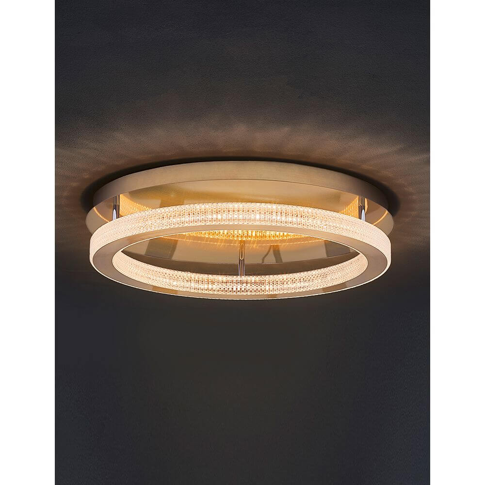 Fiore LED Deckenlampe Antik-Gold mit funkelnden Kristallelementen und warmweißer Lichtfarbe.