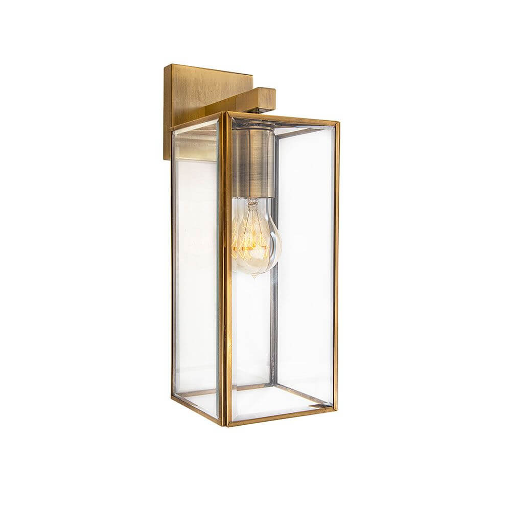 Flavio Wandleuchte Laterne Messing, Klar mit glasklarem Design und moderner Beleuchtung für stilvolle Räume.