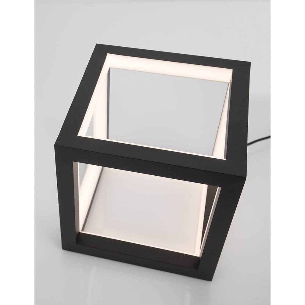 Gabbia LED Würfel Tischlampe mit modernem, rechteckigem Design in schwarz und edlem, integriertem Licht.