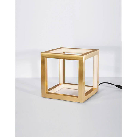Gabbia LED Würfel Tischlampe aus Aluminium und Silikon in edler goldener Farbe, modern und zeitlos.