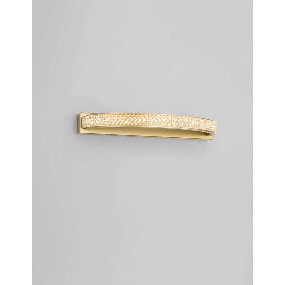 Grania LED Wandleuchte in elegantem Design mit goldener Oberfläche, ideal für moderne Innenräume.