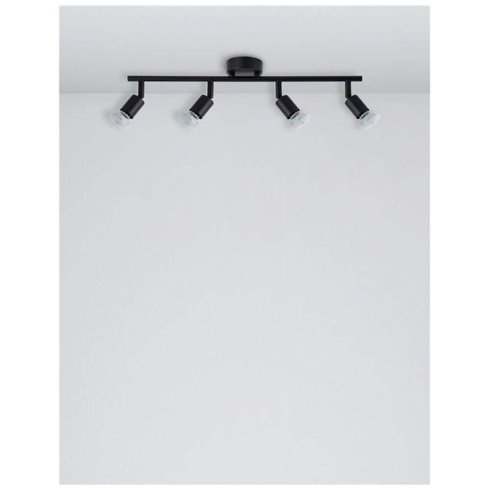 Lup Deckenstrahler 4-flammig Metall in schwarzem Design an der Decke montiert.