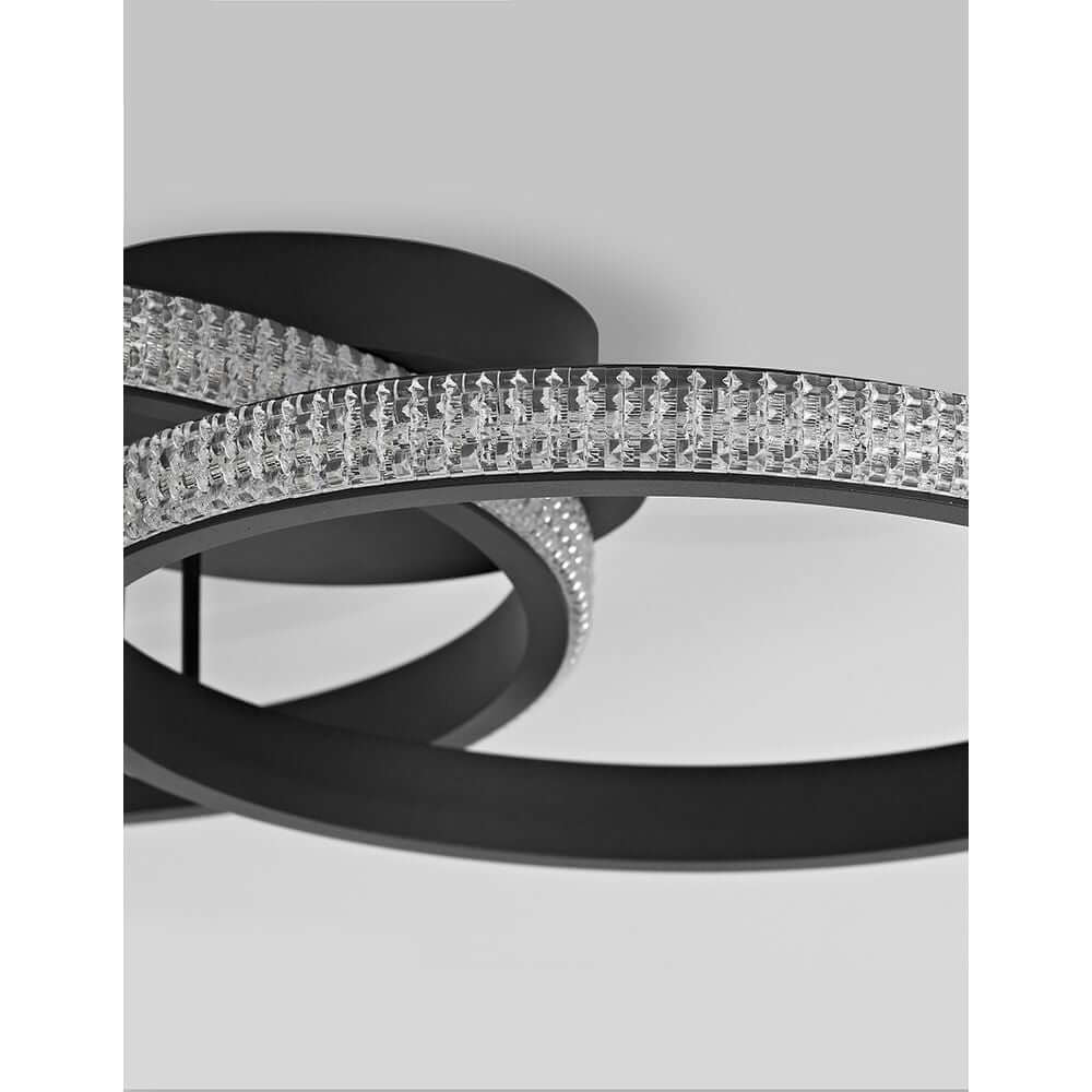 Nager LED Deckenleuchte Sandig-Schwarz mit elegantem Design und Kristallelementen, ideal für moderne Innenräume.