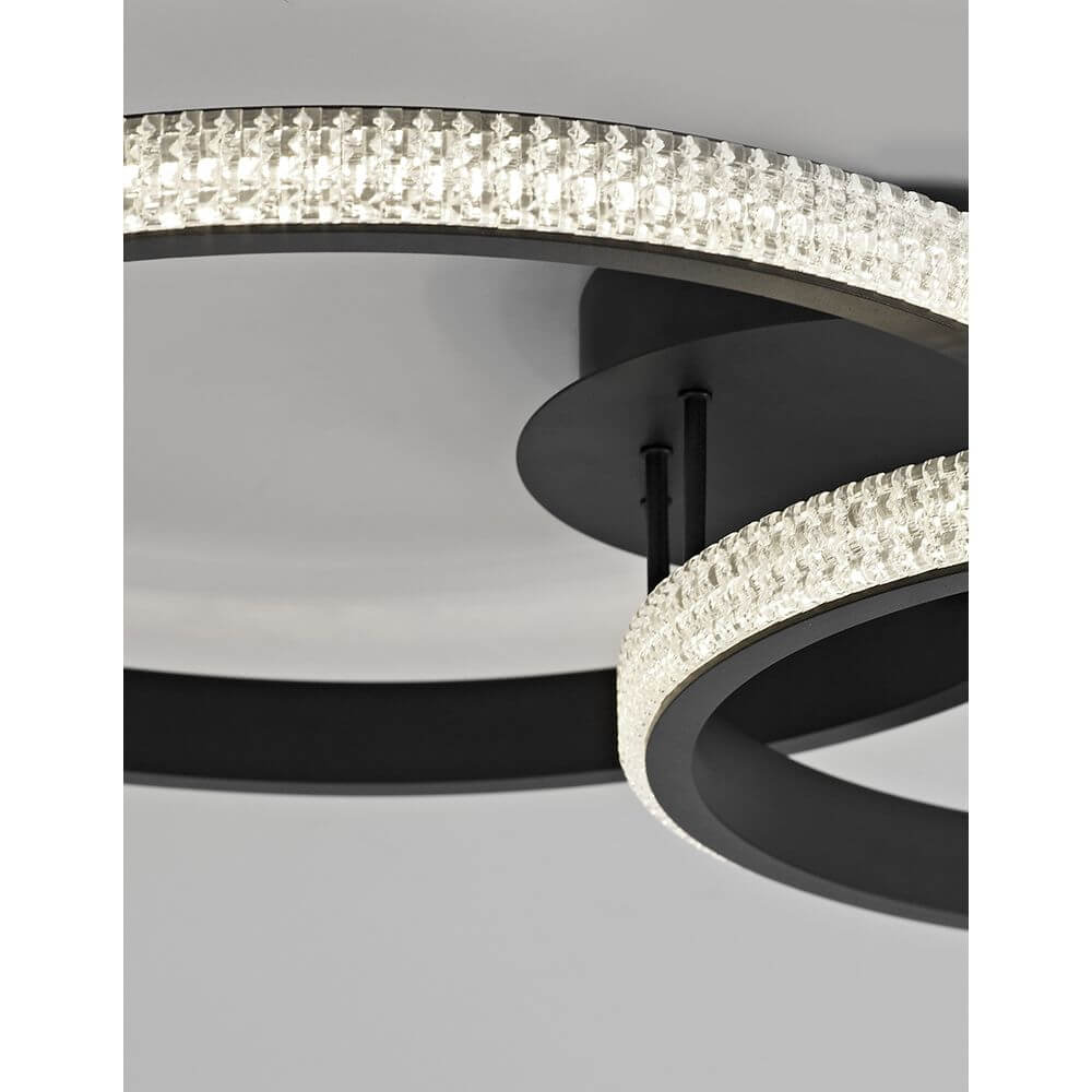Nager LED Deckenleuchte Sandig-Schwarz mit eleganten LED-Ringen und stilvollem Design.