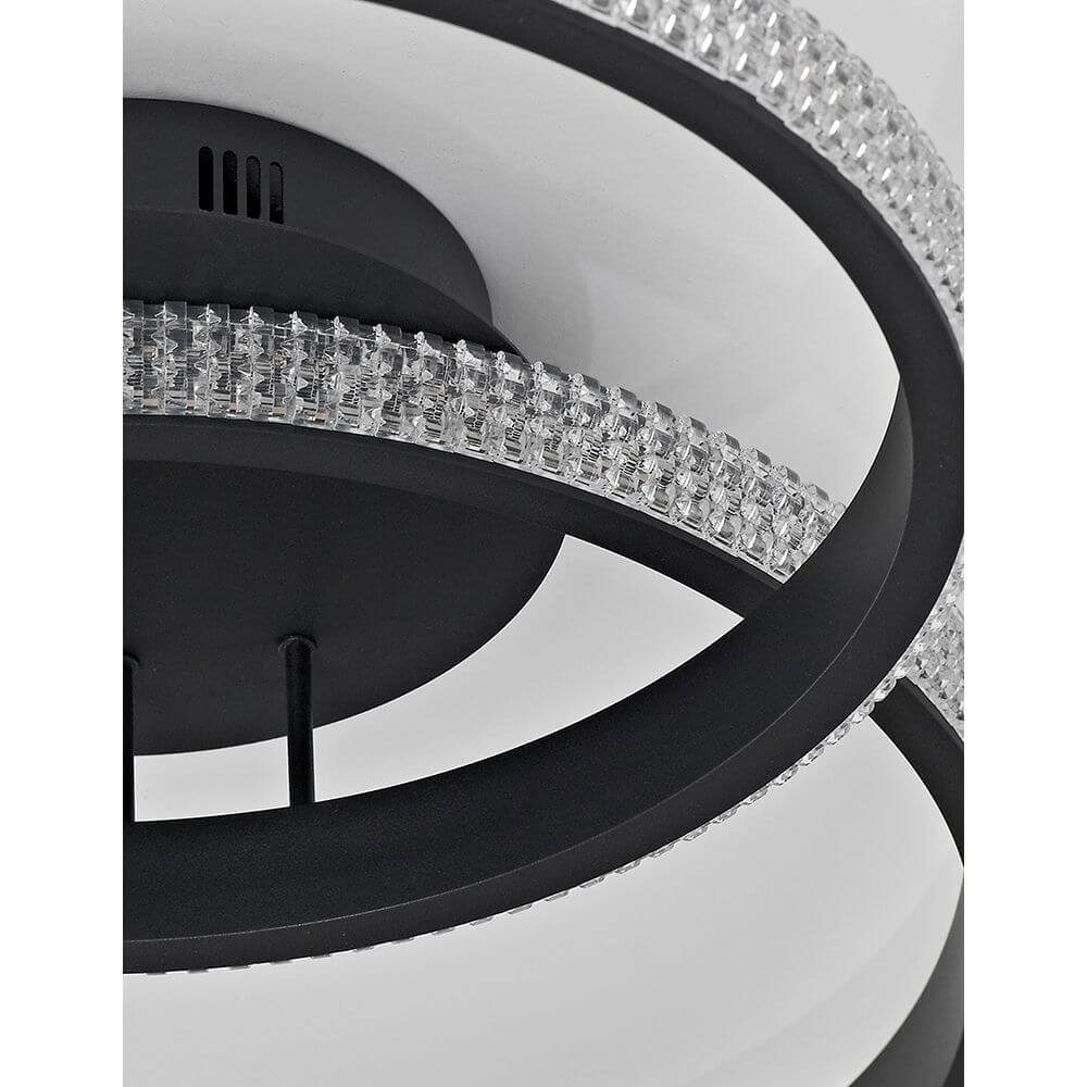 Nager LED Deckenleuchte Sandig-Schwarz mit modernem Design und transparenten Elementen.