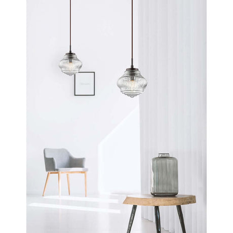 Nord glass pendant light Clear, Brown in a modern living room with table and chair.