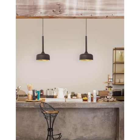 Nuorese metal pendant light brown in a modern dining room above a kitchen island.