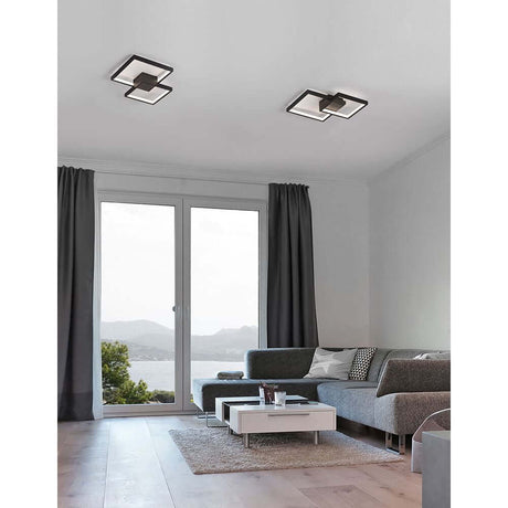 Moderne Porto LED Deckenlampe im Wohnzimmer, zeitloses Design über gemütlicher Couch.