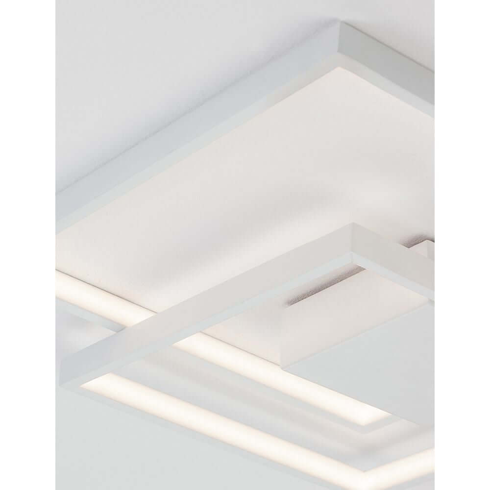 Porto LED Deckenleuchte Metall Weiß im modernen Design mit warmweißem Licht, ideal für Wohnzimmer und Schlafzimmer.
