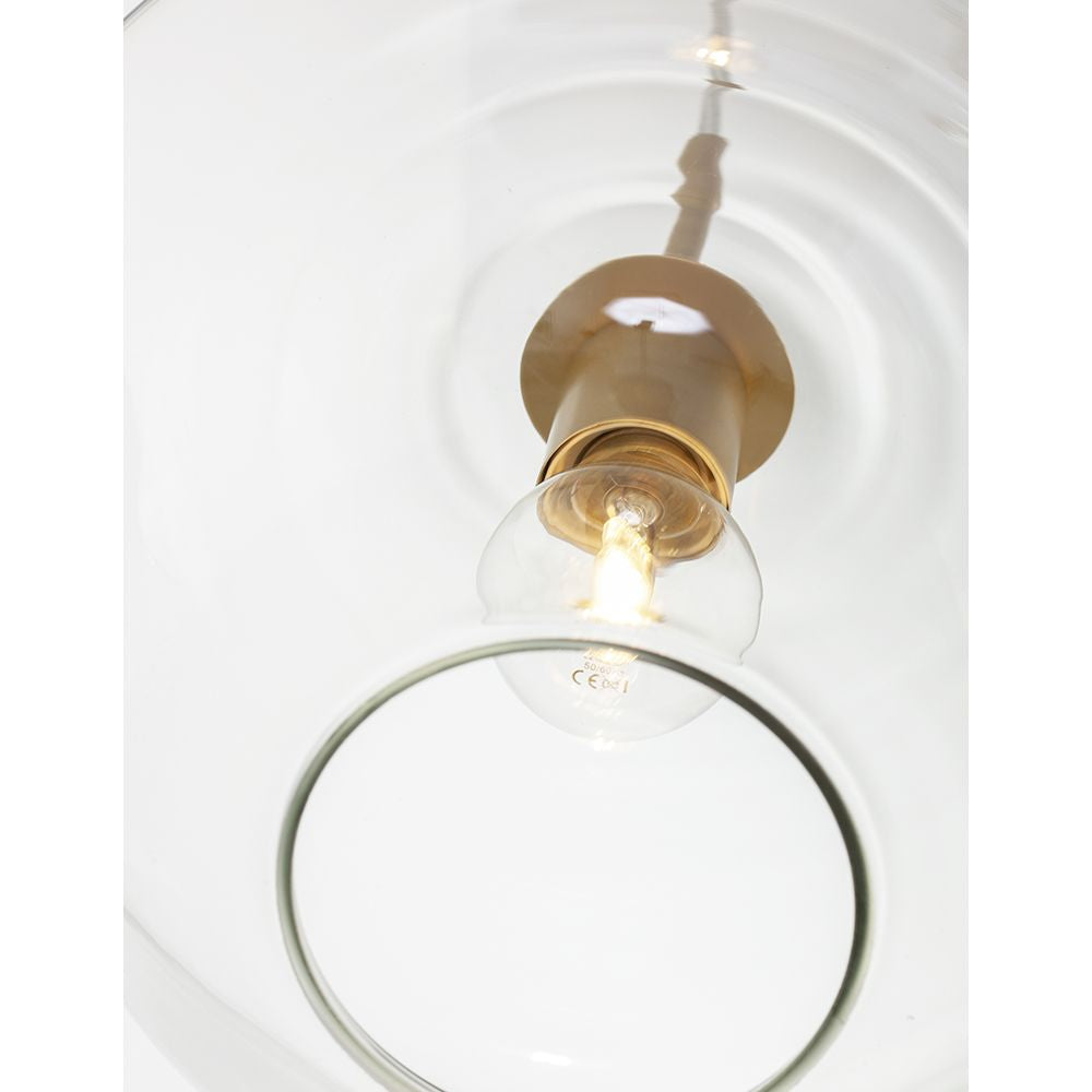 Ansicht der PRISMA Pendelleuchte mit transparentem Glas und goldenem Metallrahmen, ideal für modernes Wohndesign.