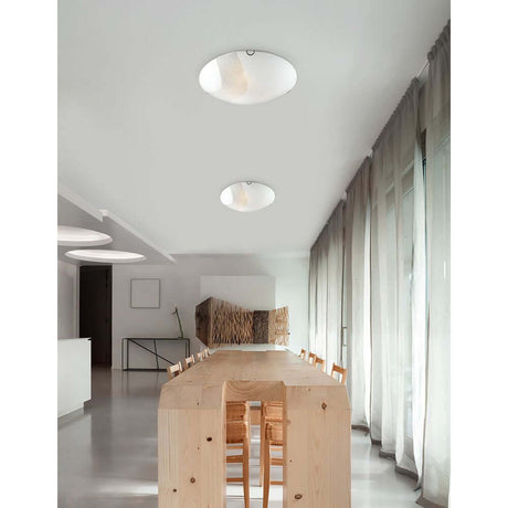 Moderne Raumansicht mit Nova Luce Quale Glas Deckenleuchte 3-flammig Kristall über einem Holztisch