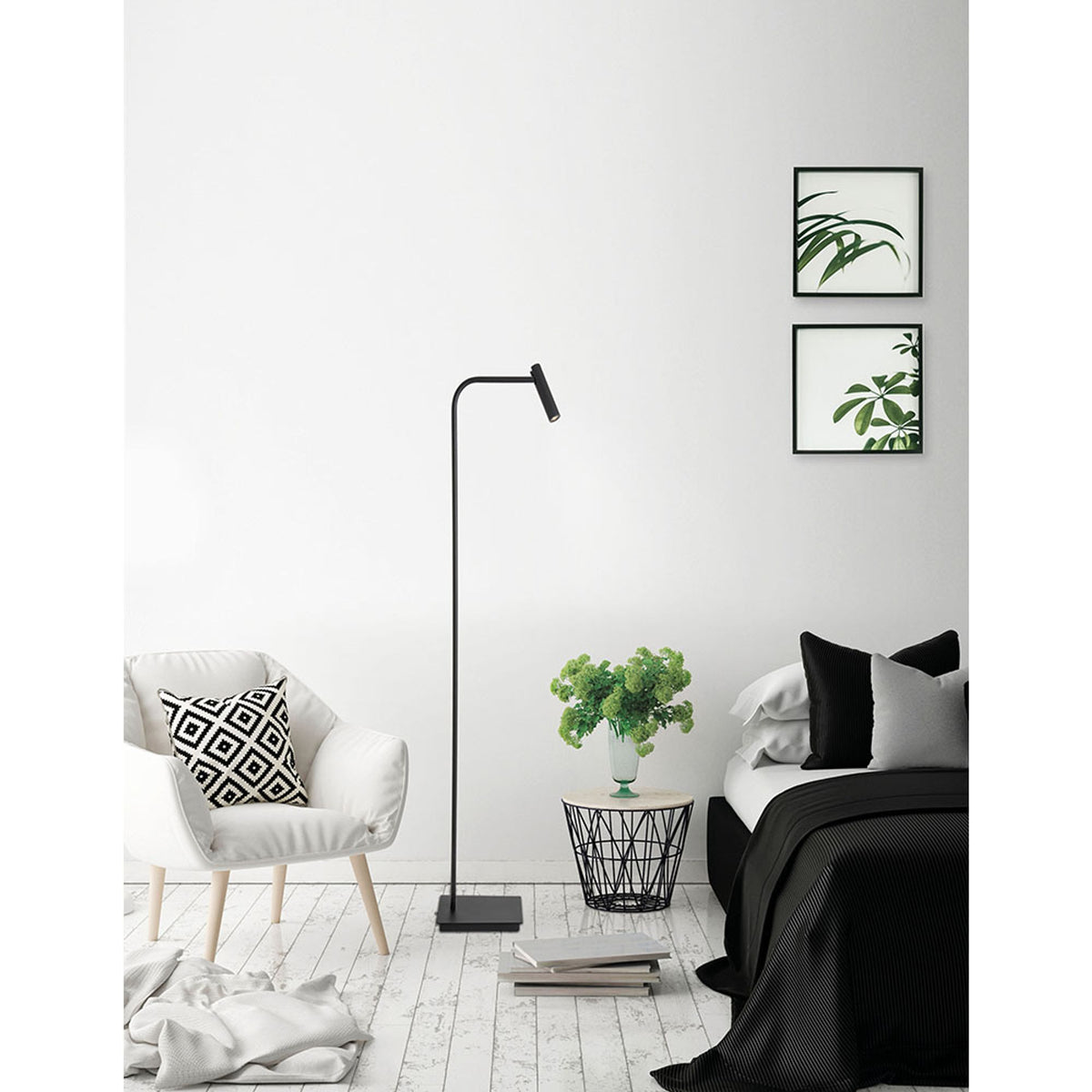 Nova Luce Sicily LED adjustable floor lamp in black with curved arm in a modern bedroom