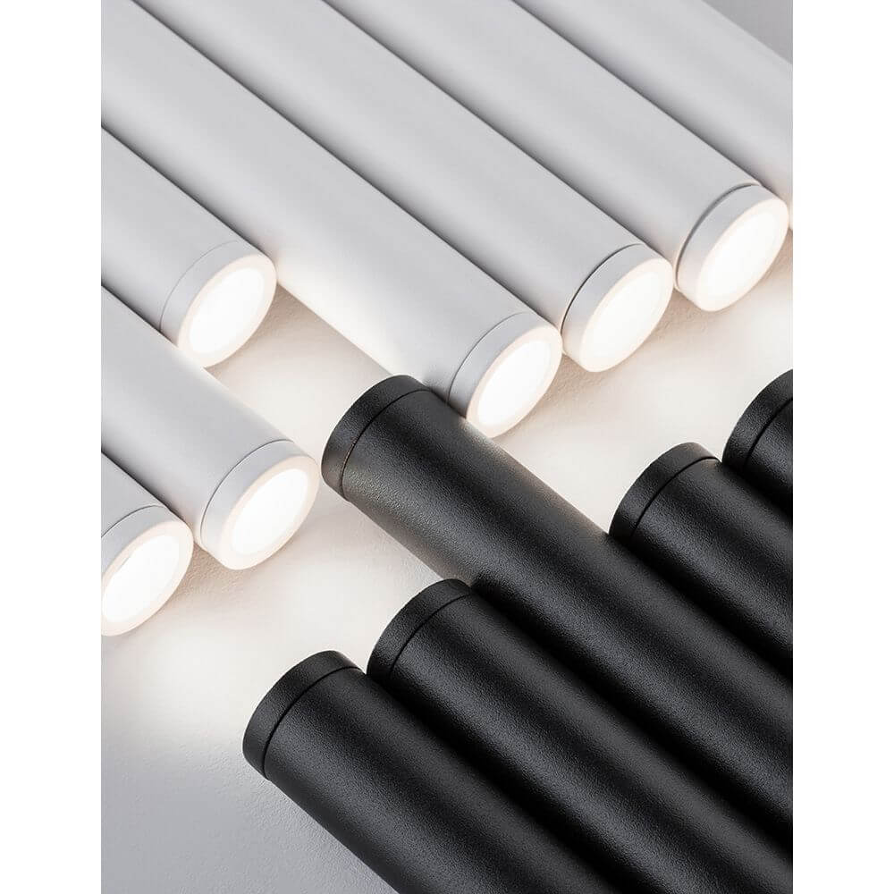 Detailansicht der Ultrathin LED Hängeleuchte 7-flammig in den Farben Schwarz und Weiß.