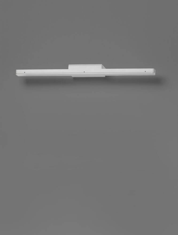 Nyx LED Wandleuchte 3000K IP44 montiert an einer grauen Wand.